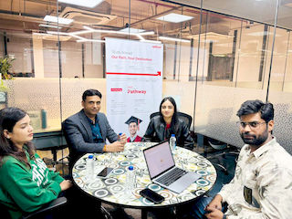 upGrad Indore Office - student and parents with the counselling team after their study abroad session